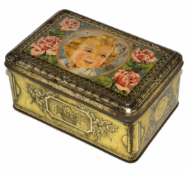 Vintage tin La Biscuiterie Nantaise with a young girl and roses on the lid