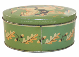 Oval biscuit tin by Verkade Zaandam with horse, rider and hunting dog.