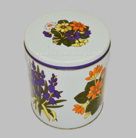 Vintage set of three nestable tins with floral decor