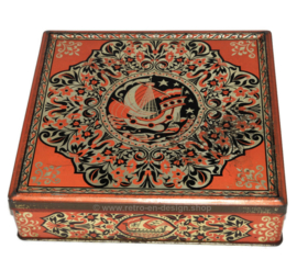 Vintage cookie tin made by Verkade with images of ships and floral patterns