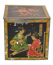 Lata de té vintage en forma de cubo con imágenes orientales