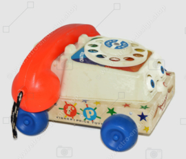 De originele vintage Fisher-Price "Chatter" Speelgoedtelefoon uit 1961