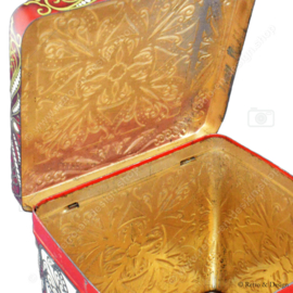 Dose in Würfelform mit Reliefdekor in Weiß, Rot und Gold