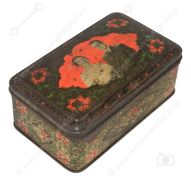 Vintage tin with an image of Princess Juliana and Prince Bernhard in relief