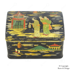 Boîte en métal japonaise vintage avec des images emblématiques d'un homme et d'une femme, du Mont Fuji, des pagodes et plus encore