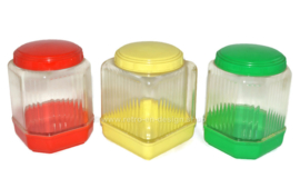 Vintage 60s plastic BK storage canisters in red, yellow and green