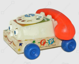 De originele vintage Fisher-Price "Chatter" Speelgoedtelefoon uit 1961