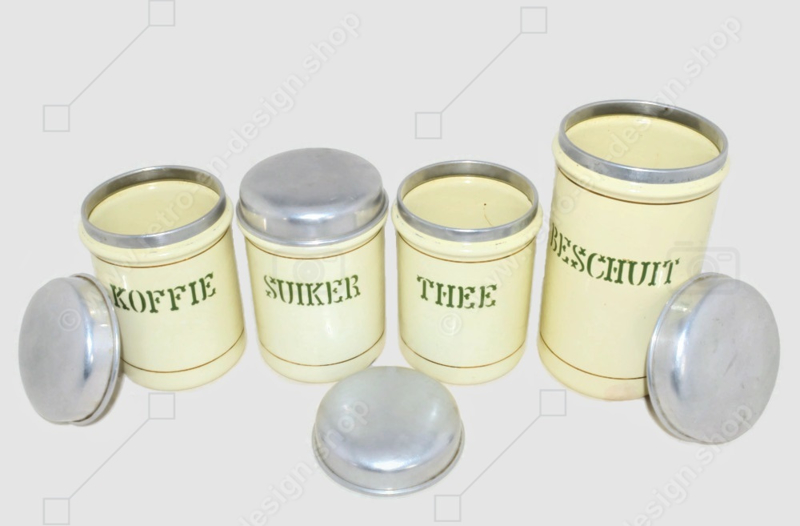 Set of four cream-coloured brocante enamelled storage containers for coffee, sugar, tea and rusk with reseda green letters