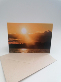 Dubbele kaart zonsondergang met enveloppe