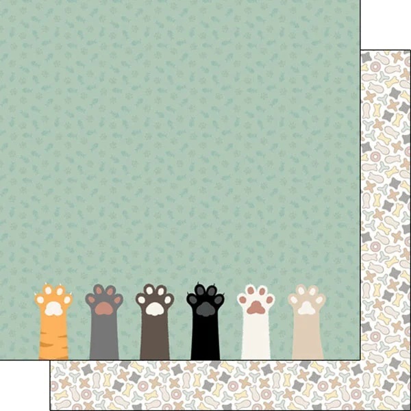Dubbelzijdig scrapbook papier met kattenpootjes op een mintgroene achtergrond aan de voorkant en een patroon van botjes op de achterkant.