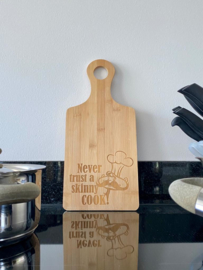 Houten snijplank "Never trust a skinny cook