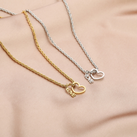 Stainless steel ketting, bedels “hart” en “love”. Goud.