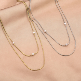 Stainless steel ketting, dubbellaags, met pareltjes. Goud