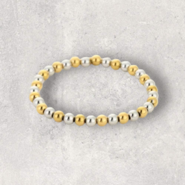Elastieke Armband van goud én zilver stainless steel kralen.