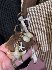 Charm London. Tas bruin-ecru gevlochten.