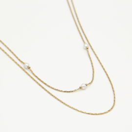 Stainless steel ketting, dubbellaags, met pareltjes. Goud