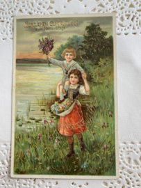 Briefkaarten | Duitsland | Kinderen | Herzlichen Glückwünschen! zum Namenstage - Jongen en meisje in het gras aan de rivier - Goudopdruk