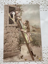 Ansichtkaart | Belgie | Kinderen | 1914 |  Jongen en meisje met eieren en kuikentjes