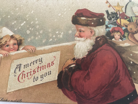 Kerstkaarten | Kerstmannen | Nieuwe blanco kerstkaart of cadeau label 'A Merry Christmas to you' | Kerstman in de sneeuw met zak vol speelgoed
