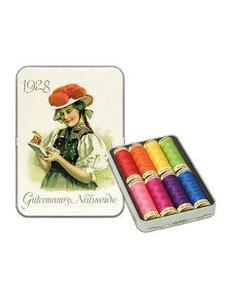 GÜTERMANN nostalgisch blikje met 8 klosjes naaigaren - vrolijke kleuren