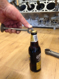 Valve open up, bottle opener