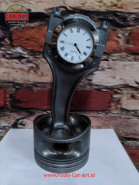 Piston clock fatal attraction