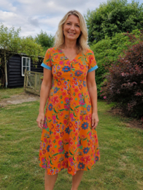 Stenzo stof oranje met bloemen