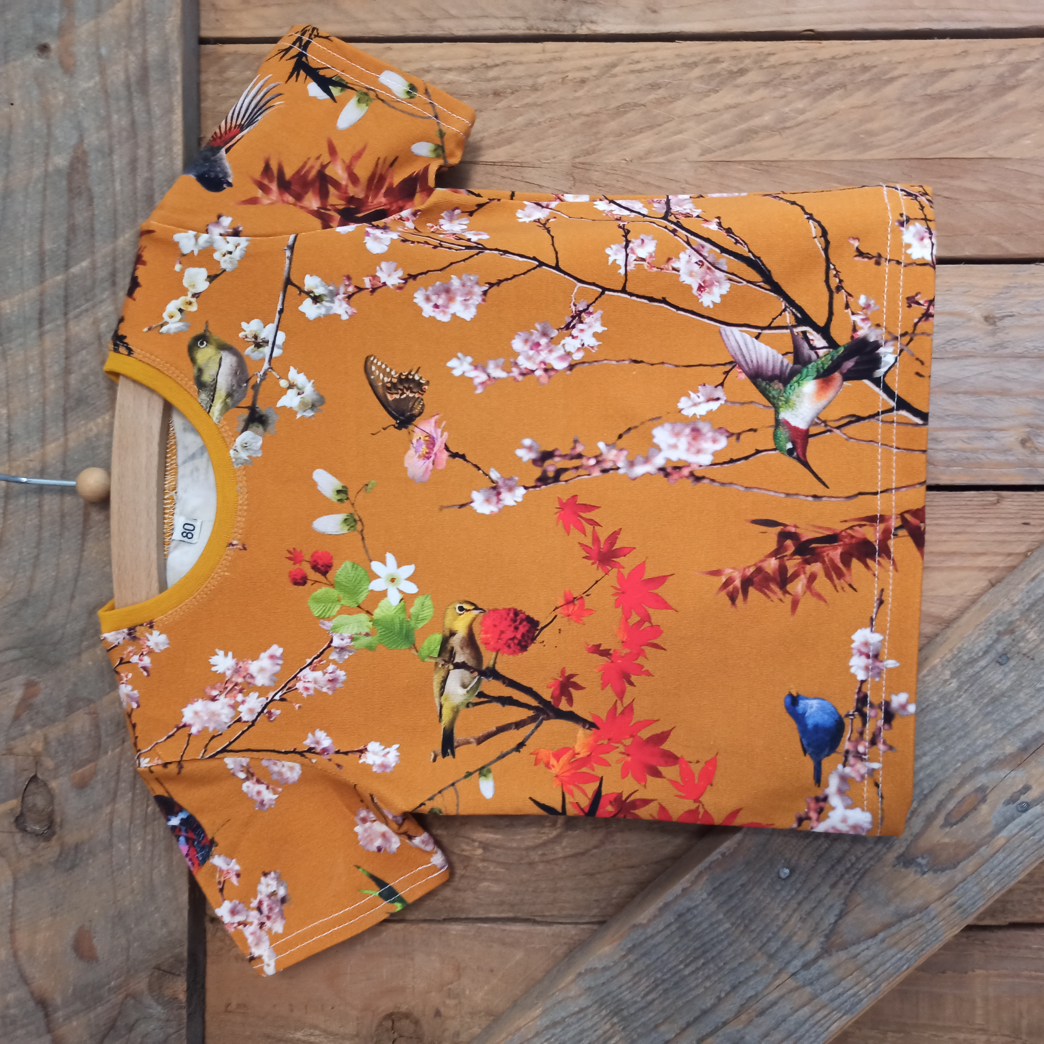 T-shirt kolibri okergeel maat 80