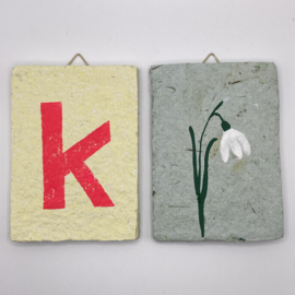 letter --  pink letter on yellow tile