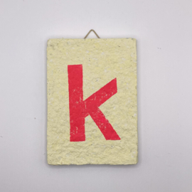 letter --  pink letter on yellow tile