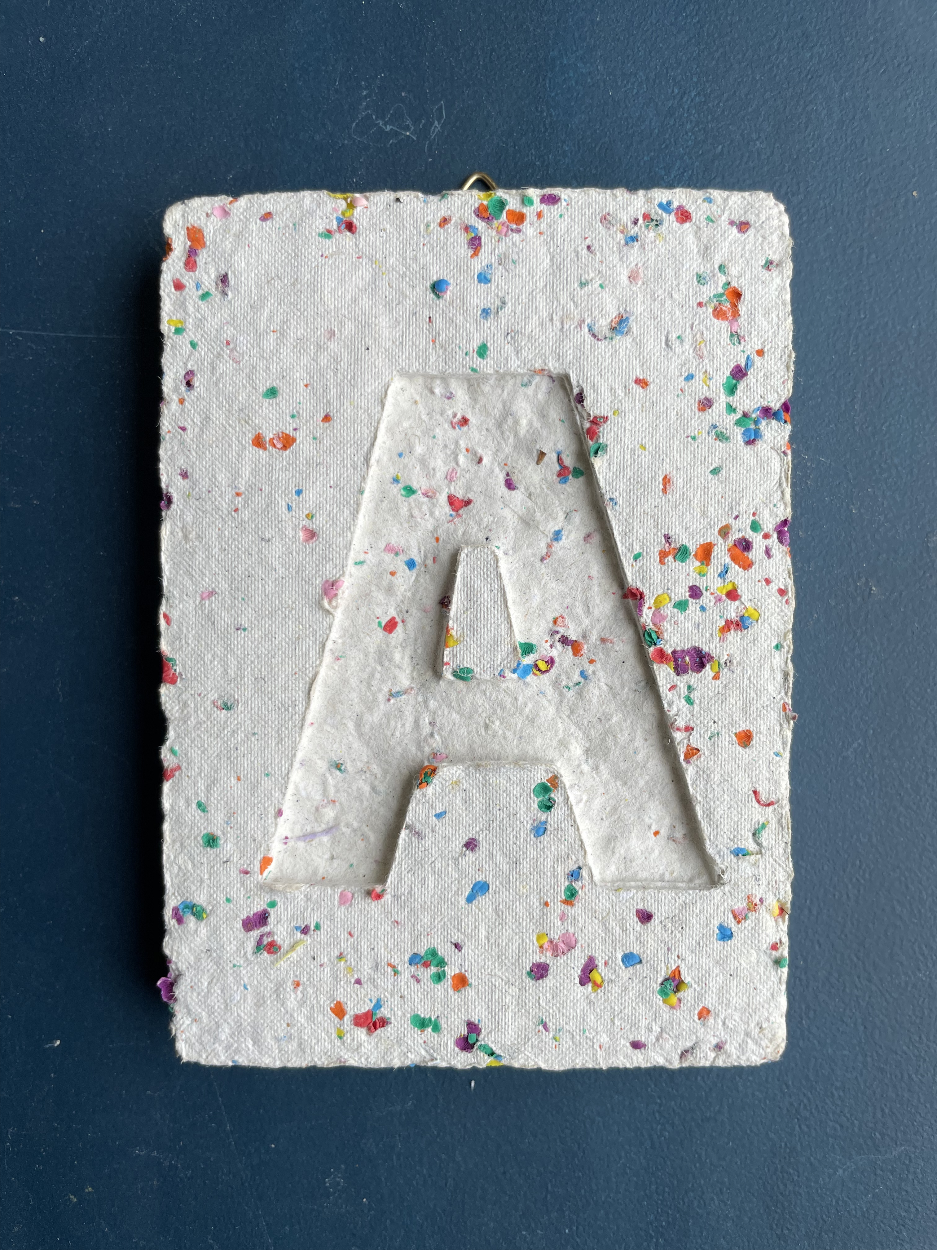 Letter with speckles