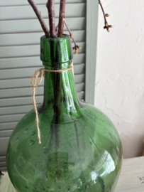 groene glazen fles met kurkje