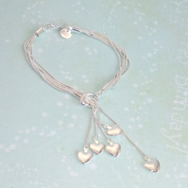 zilveren bedelarmband met 5 hartjes