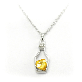 Goudgeel hart in flesje met ketting