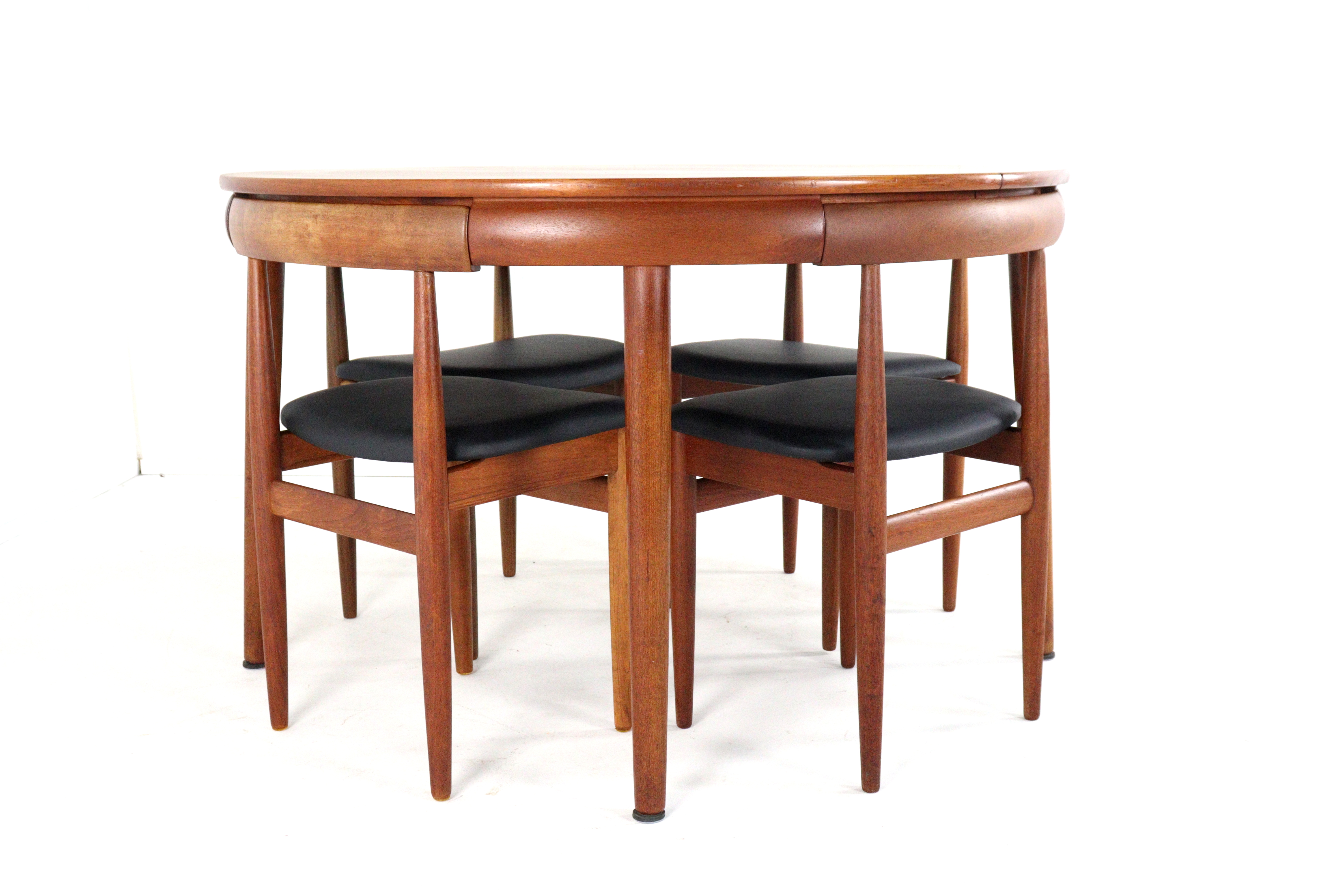 Hans Olsen voor Frem Røjle roundette eettafel + stoelen