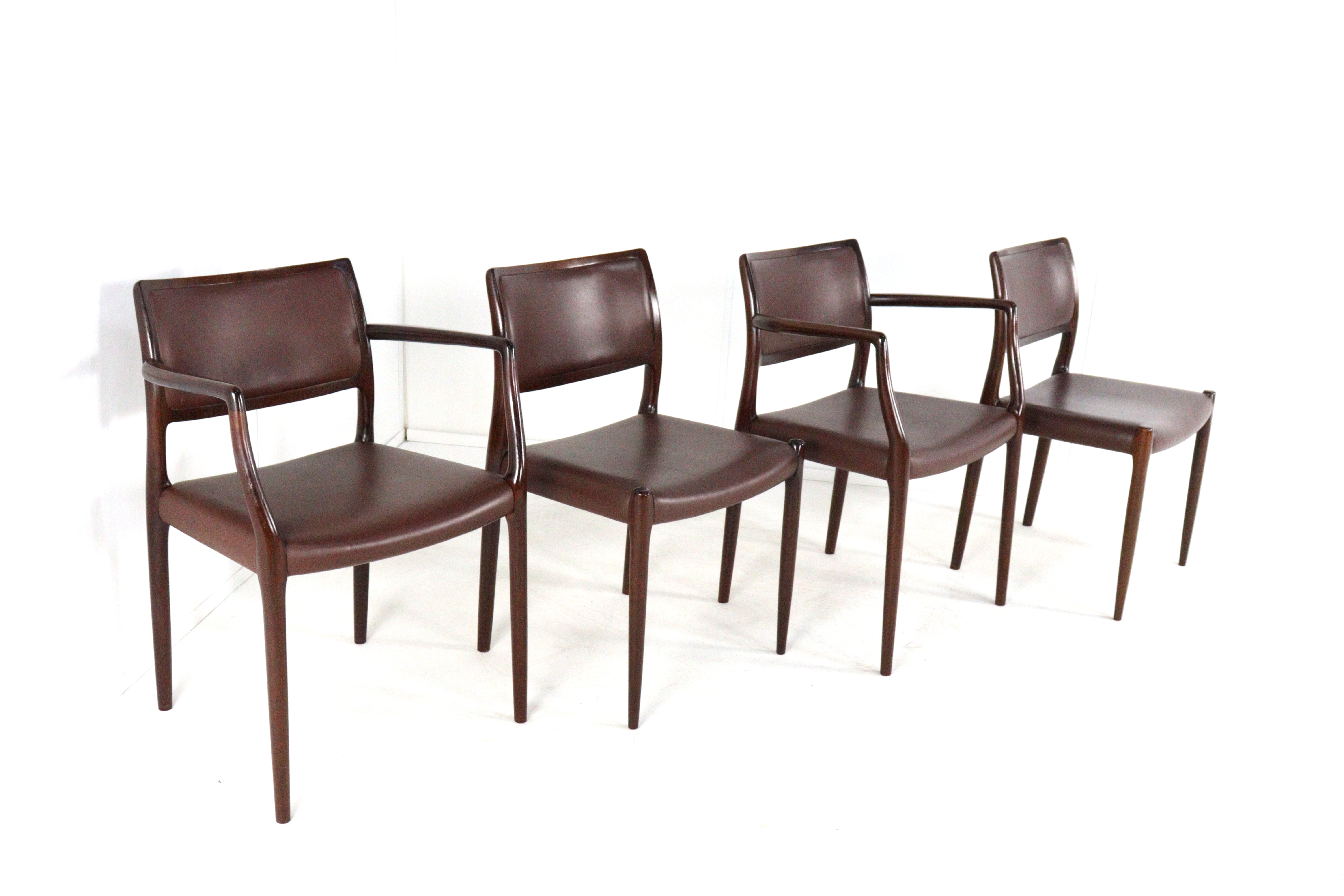 Set van 2 + 2 palissander Niels Otto Møller stoelen model 65 + 80