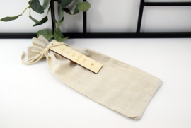 Jute zak met houten label