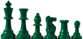 Green plastic chess pieces