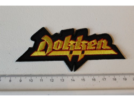 DOKKEN - RED/YELLOW NAME LOGO ( SHAPED )