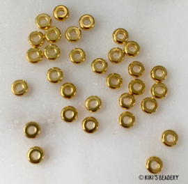 Ronde platte gouden spacerbeads  3,5mm