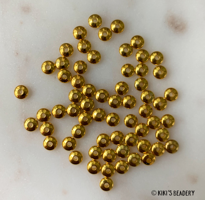 Ronde platte bolle gouden spacerbeads 5mm