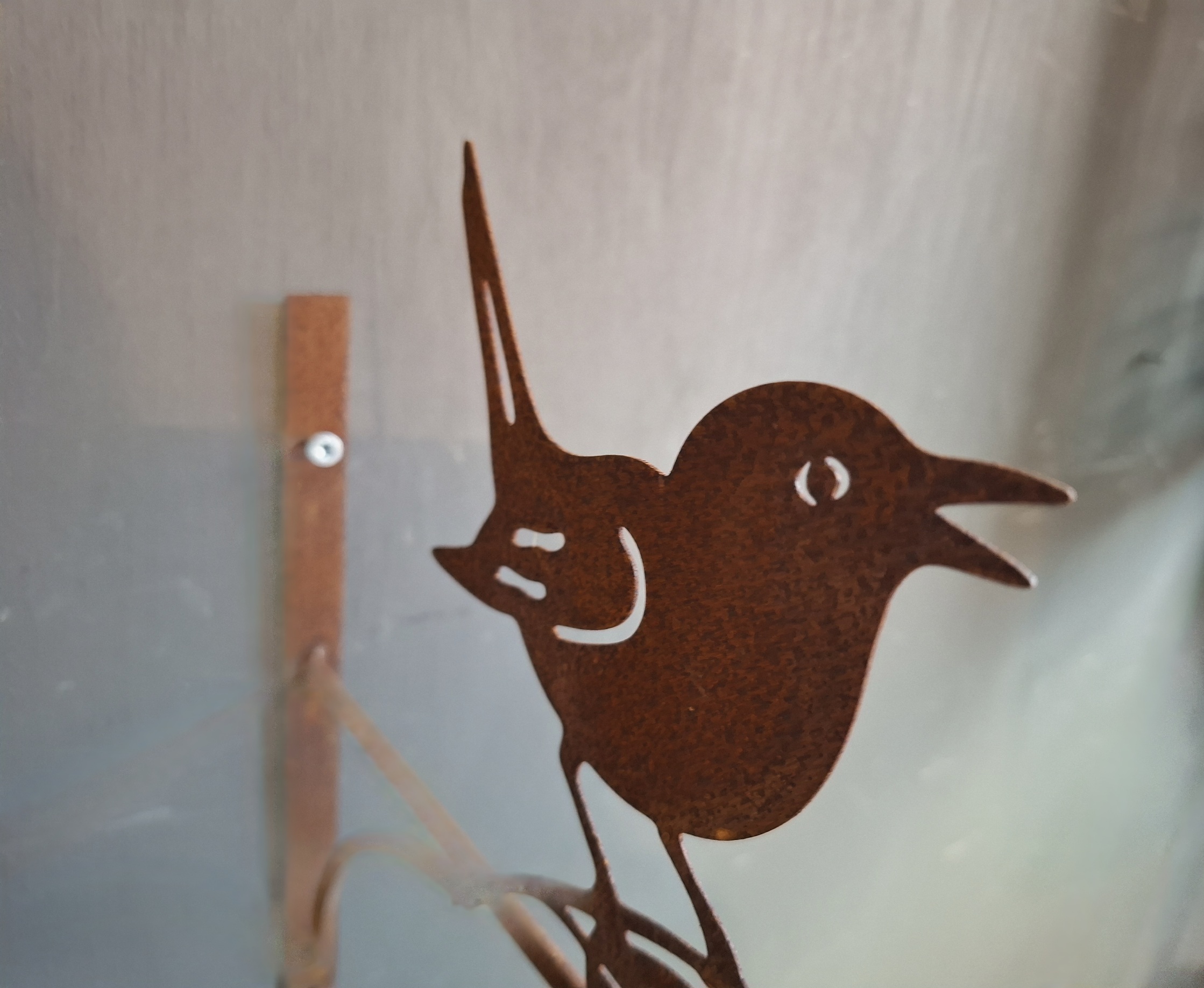 Wandhaak vogel
