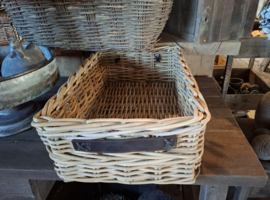 Mand met lederen handvatten