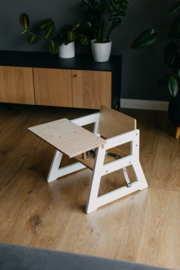 Lage kinderstoel wit