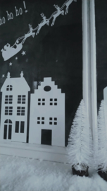 Raamsticker - Huisjes en kerstman in slee