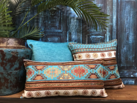 Het mixen en matchen van verschillende turquoise kussen - Boho stijl