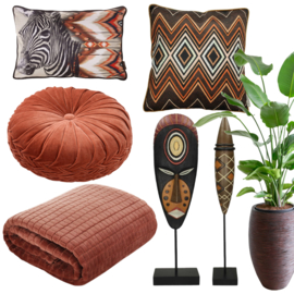 Ethno of werelds wonen - aarde en rood oranje tinten ♥ Woontrend 2025