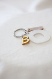 KEYCHAIN.01.SILVER.1LETTER