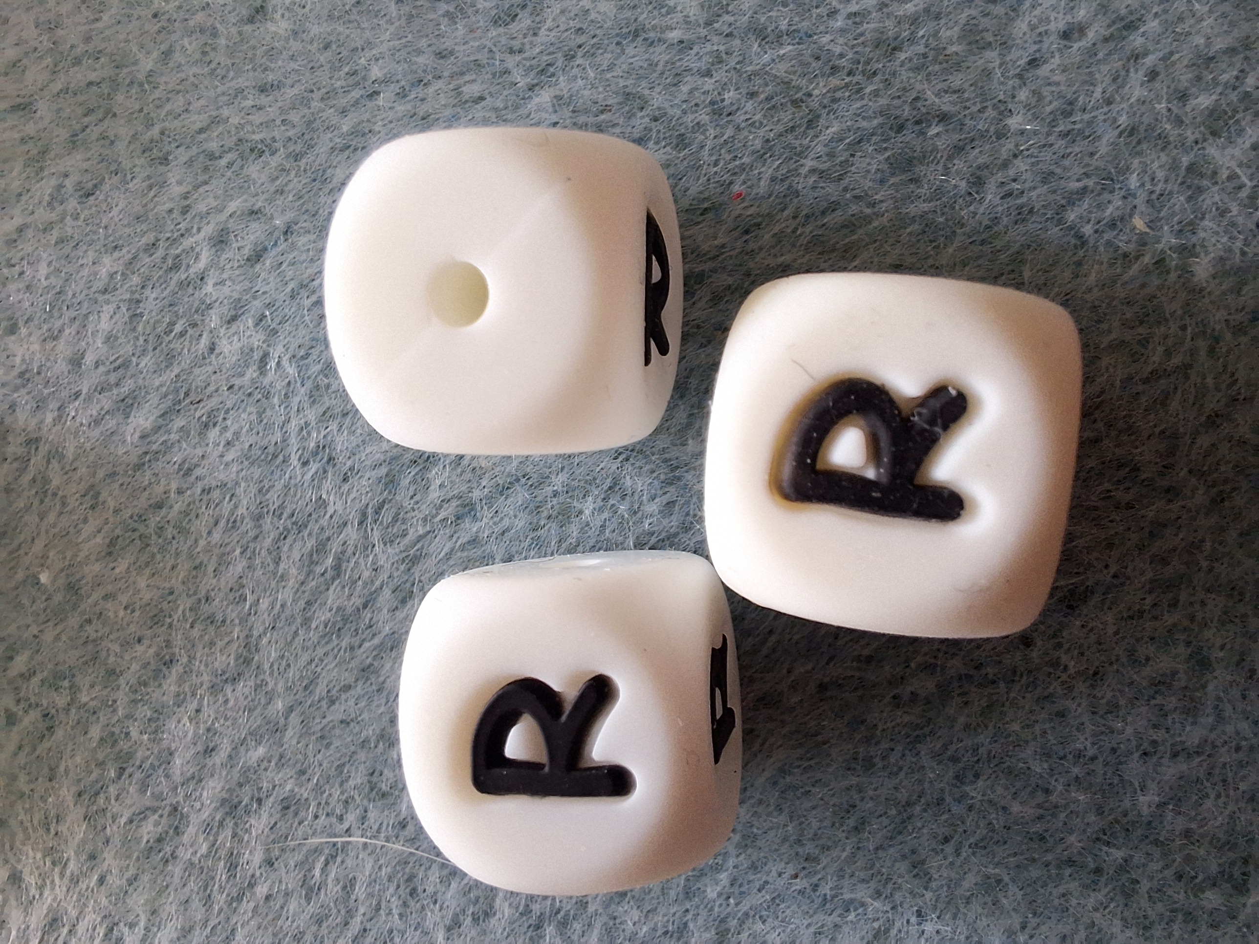 De letter R