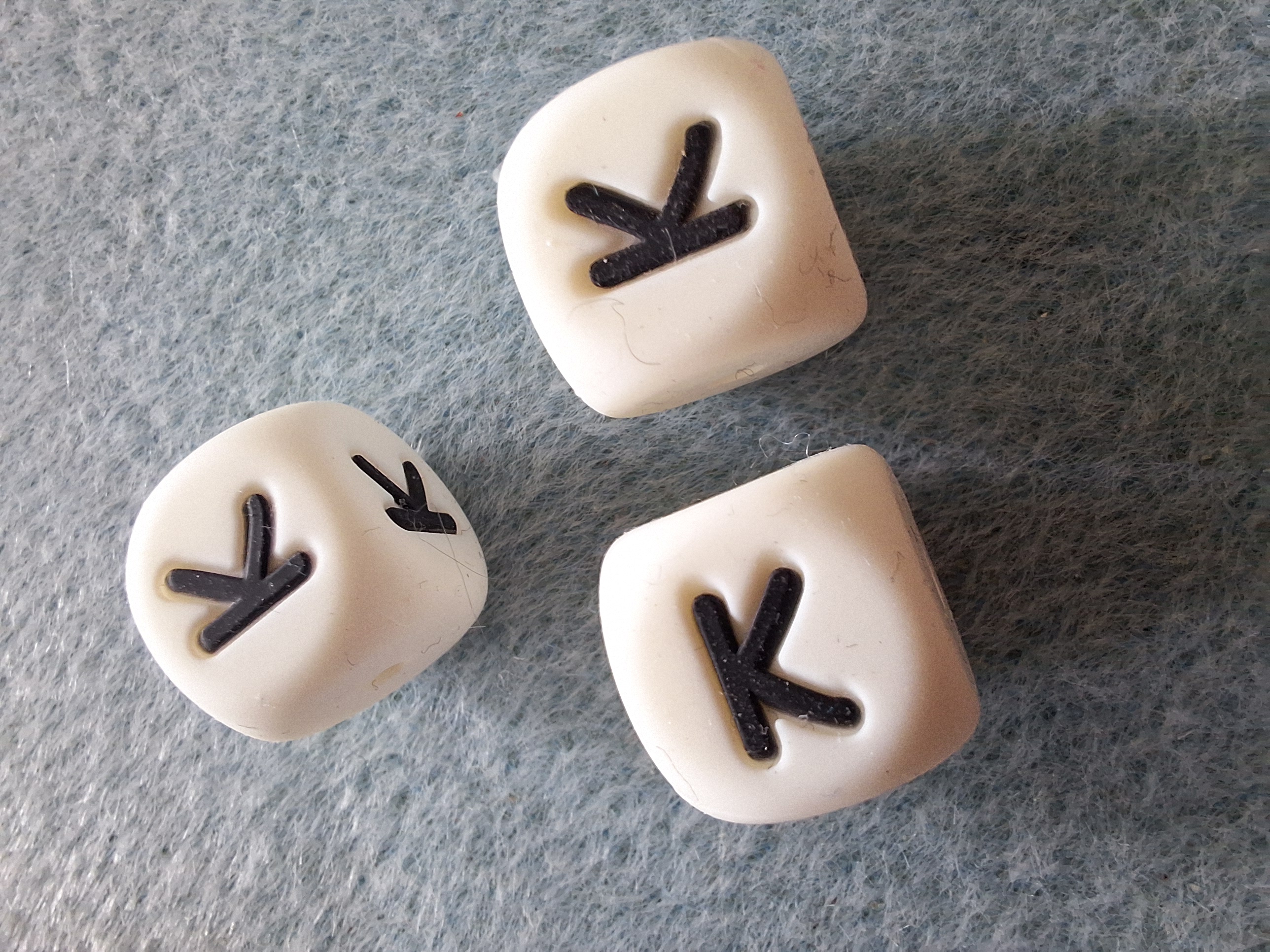 De letter K